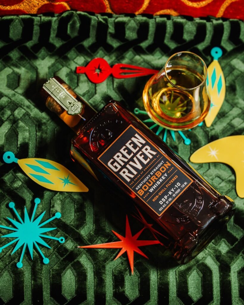 A flatlay shot of a Kentucky Straight Bourbon Whiskey bottle from Green River Distillery.