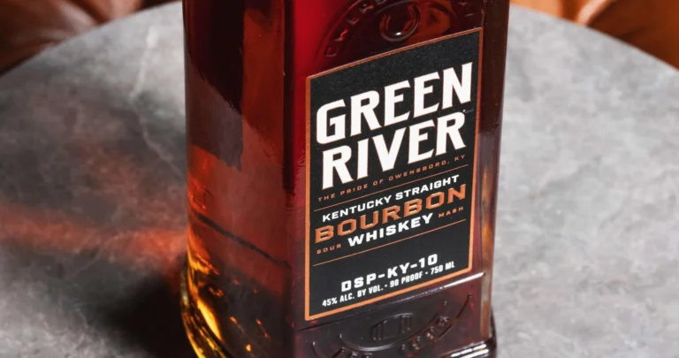 Green River Kentucky Straight Bourbon Whiskey bottle on leather surface